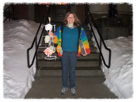 Smiling woman standing outside in snow