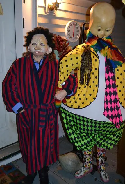 Unusual costume duo in vibrant outfits