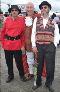 Friends dressed in colorful period clothing