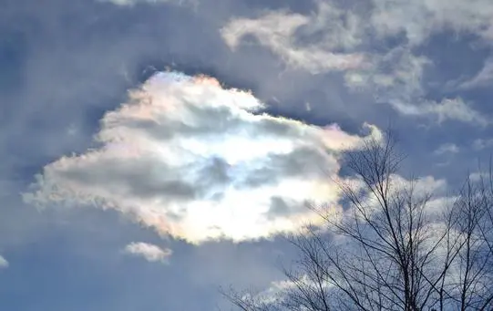 Cloud with rainbow colors in the sky