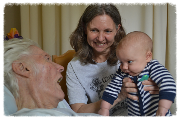 Three generations sharing a joyful moment