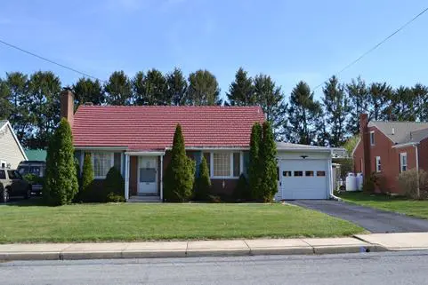 Single-story brick house front view