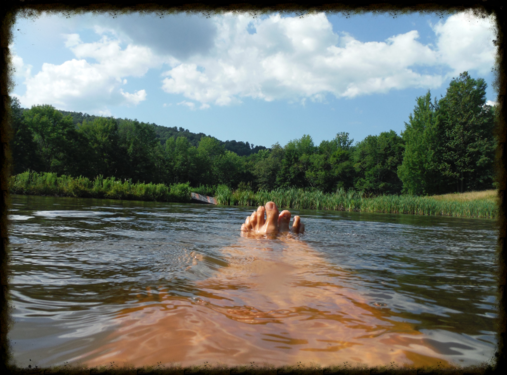 Floating in a calm lake