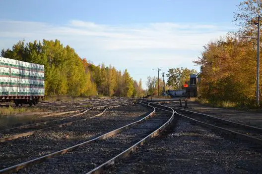Railway tracks in autumn landscape